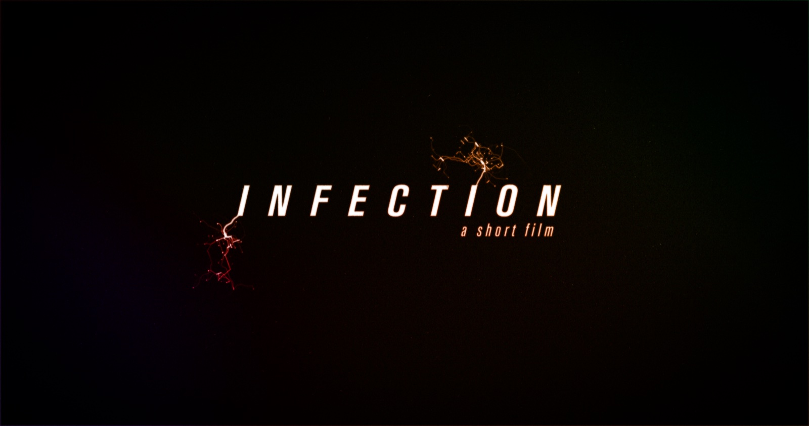 Infection title card with glowing branching forms surrounding the film title.