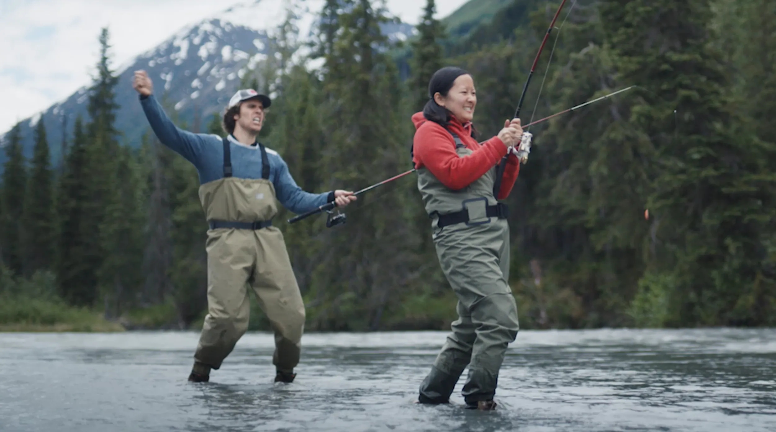 Two people fish in a mountain river in the GCI Sick Day spot